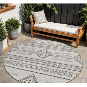Photo of 8' Beige And Brown Round Southwestern Washable Indoor Outdoor Area Rug