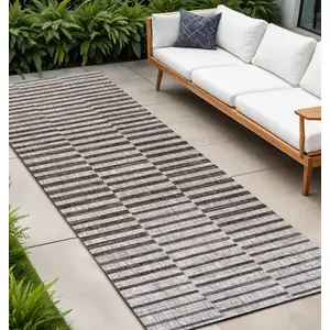 Photo of 8' Beige And Brown Striped Indoor Outdoor Runner Rug