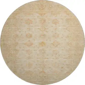 Photo of 8' Beige And Copper Oriental Washable Round Rug With UV Protection