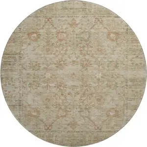 Photo of 8' Beige And Coral Oriental Washable Round Rug With UV Protection