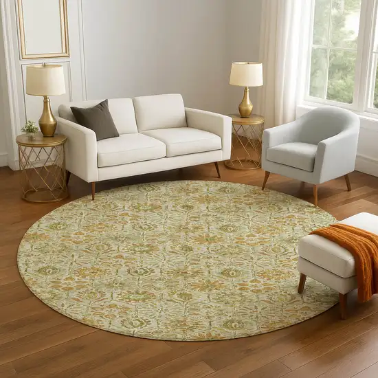 8' Beige And Gold Floral Washable Round Rug With UV Protection Photo 5