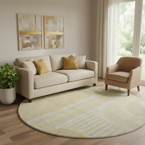 8' Beige And Gold Geometric Washable Round Rug With UV Protection Photo 1