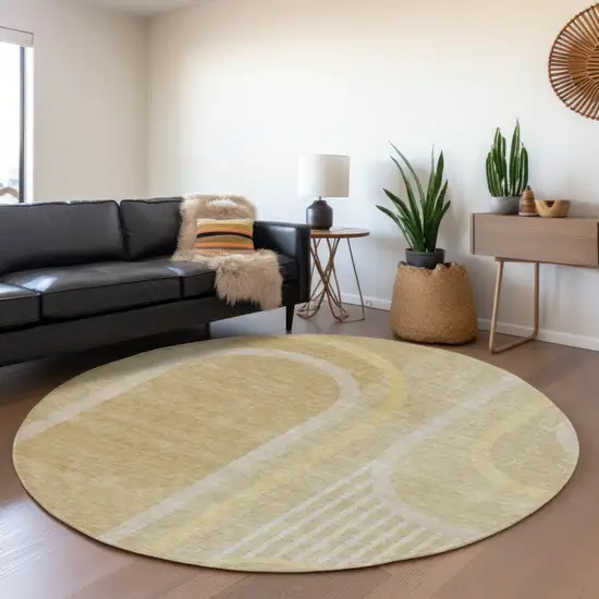 8' Beige And Gold Geometric Washable Round Rug With UV Protection Photo 4