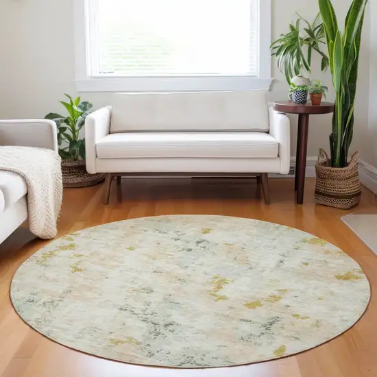 8' Beige And Gold Round Abstract Washable Indoor Outdoor Area Rug Photo 7