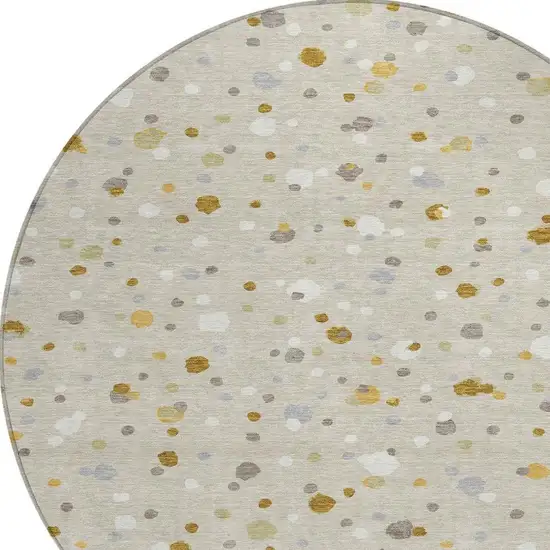 8' Beige And Gold Round Geometric Washable Indoor Outdoor Area Rug Photo 3
