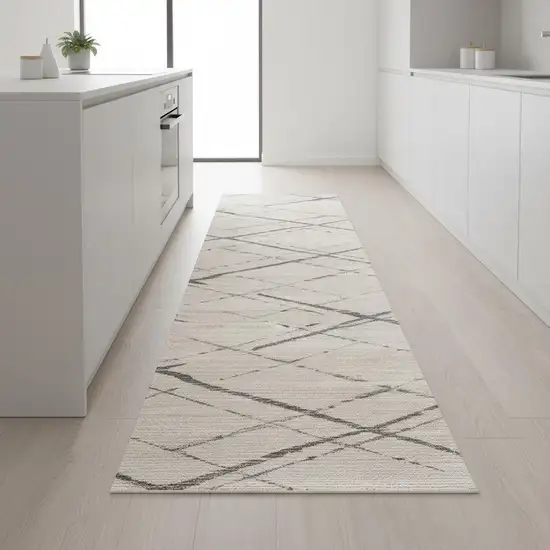 9' Beige And Gray Abstract Runner Rug Photo 1