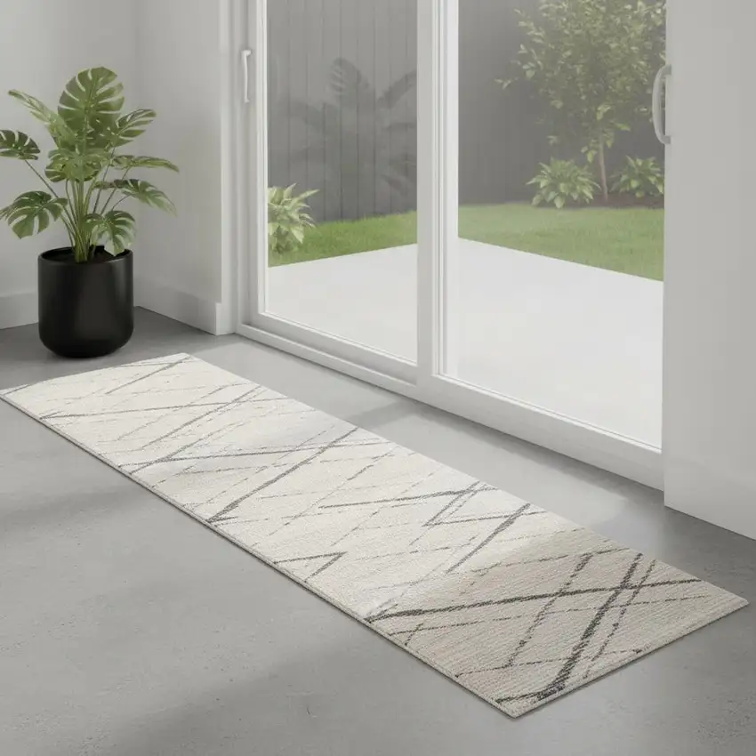 7' Beige And Gray Abstract Runner Rug Photo 1