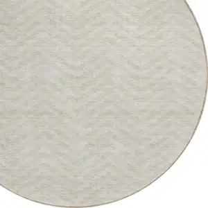 Photo of 8' Beige And Gray Round Chevron Washable Indoor Outdoor Area Rug
