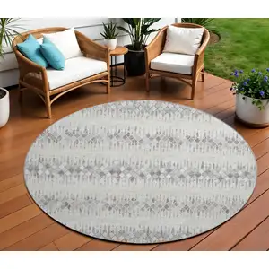 Photo of 8' Beige And Gray Round Ikat Washable Indoor Outdoor Area Rug