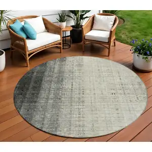 Photo of 8' Beige And Gray Round Striped Washable Indoor Outdoor Area Rug