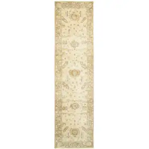 Photo of 10' Beige And Gray Wool Oriental Hand Knotted Runner Rug