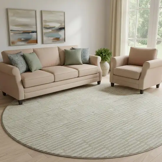 8' Beige And Ivory Abstract Geometric Washable Round Rug With UV Protection Photo 1