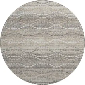 Photo of 8' Beige And Ivory Abstract Geometric Washable Round Rug With UV Protection