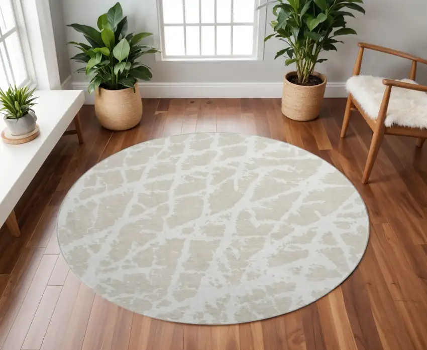 8' Beige And Ivory Abstract Washable Round Rug With UV Protection Photo 2