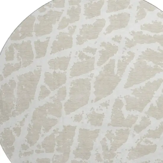 8' Beige And Ivory Abstract Washable Round Rug With UV Protection Photo 3