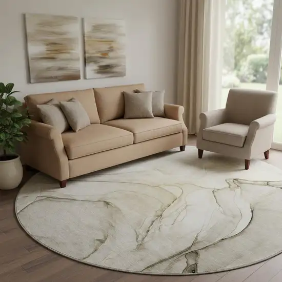 8' Beige And Ivory Abstract Washable Round Rug With UV Protection Photo 1