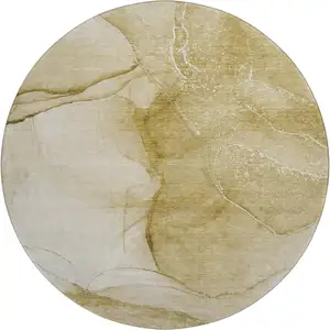 Photo of 8' Beige And Ivory Abstract Washable Round Rug With UV Protection