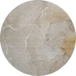 Photo of 8' Beige And Ivory Abstract Washable Round Rug With UV Protection