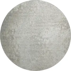 Photo of 8' Beige And Ivory Abstract Washable Round Rug With UV Protection