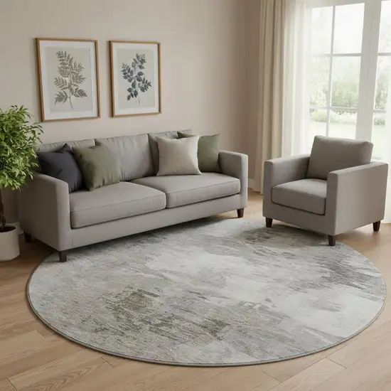 8' Beige And Ivory Abstract Washable Round Rug With UV Protection Photo 1