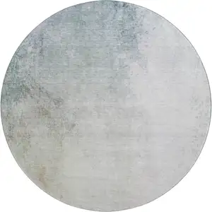 Photo of 8' Beige And Ivory Abstract Washable Round Rug With UV Protection