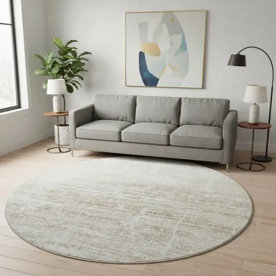 8' Beige And Ivory Abstract Washable Round Rug With UV Protection Photo 2