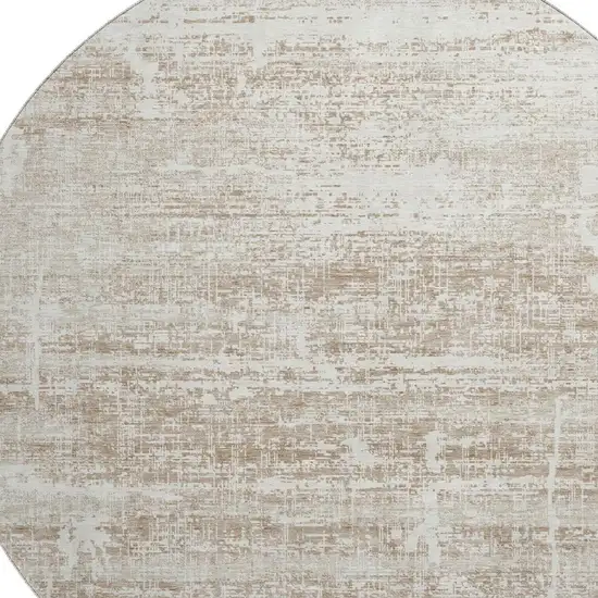 8' Beige And Ivory Abstract Washable Round Rug With UV Protection Photo 3