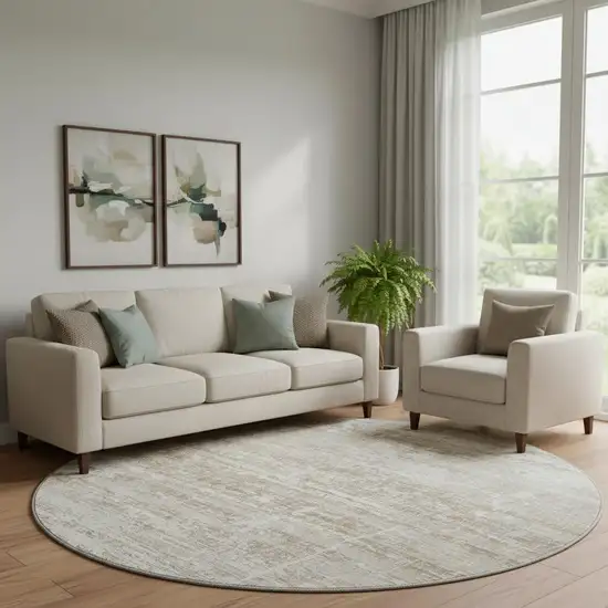 8' Beige And Ivory Abstract Washable Round Rug With UV Protection Photo 1