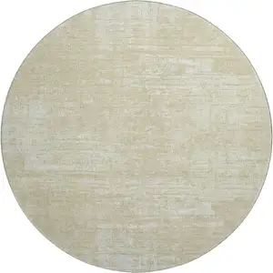 Photo of 8' Beige And Ivory Abstract Washable Round Rug With UV Protection