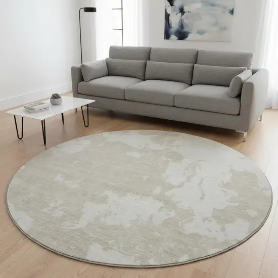 8' Beige And Ivory Abstract Washable Round Rug With UV Protection Photo 2