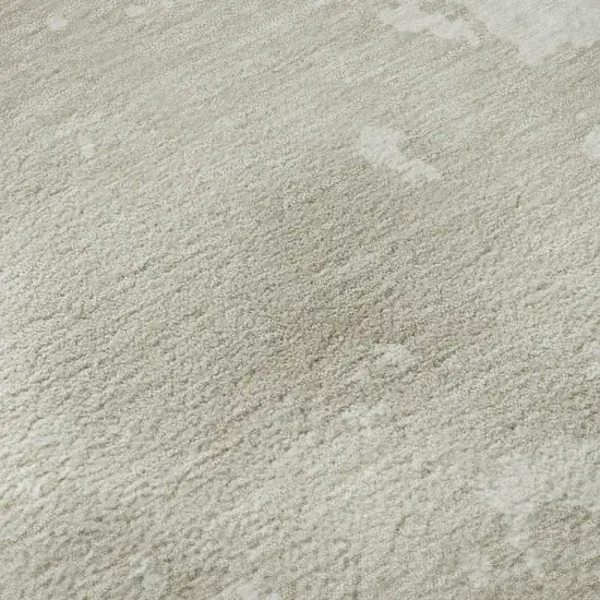 8' Beige And Ivory Abstract Washable Round Rug With UV Protection Photo 9