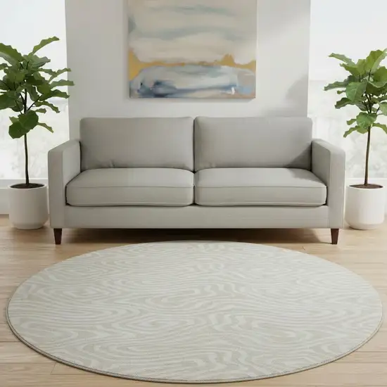 8' Beige And Ivory Abstract Washable Round Rug With UV Protection Photo 2