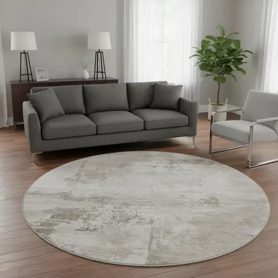8' Beige And Ivory Abstract Washable Round Rug With UV Protection Photo 2