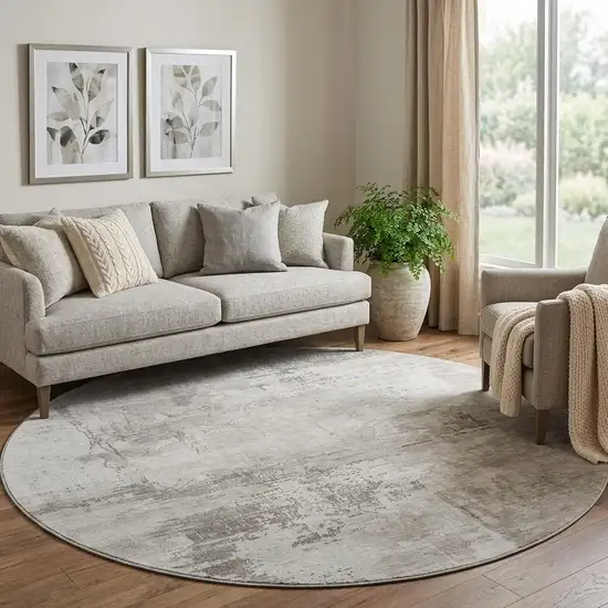 8' Beige And Ivory Abstract Washable Round Rug With UV Protection Photo 1