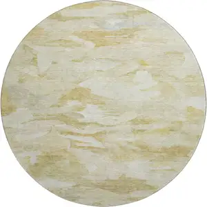 Photo of 8' Beige And Ivory Abstract Washable Round Rug With UV Protection