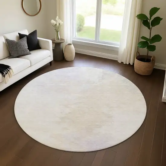 8' Beige And Ivory Abstract Washable Round Rug With UV Protection Photo 4