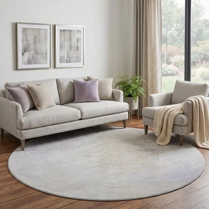 8' Beige And Ivory Abstract Washable Round Rug With UV Protection Photo 1