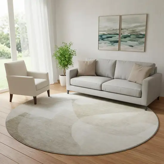 8' Beige And Ivory Abstract Washable Round Rug With UV Protection Photo 2