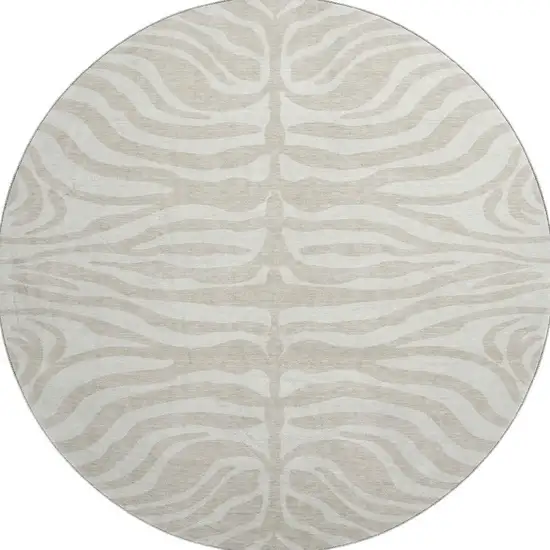 8' Beige And Ivory Animal Print Washable Round Rug With UV Protection Photo 2