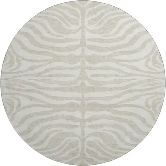 8' Beige And Ivory Animal Print Washable Round Rug With UV Protection Photo 1