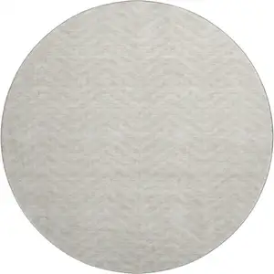 Photo of 8' Beige And Ivory Chevron Washable Round Rug With UV Protection