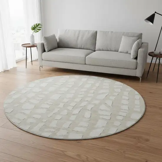 8' Beige And Ivory Cobblestone Washable Round Rug With UV Protection Photo 2