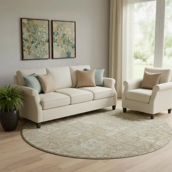 8' Beige And Ivory Floral Washable Round Rug With UV Protection Photo 1