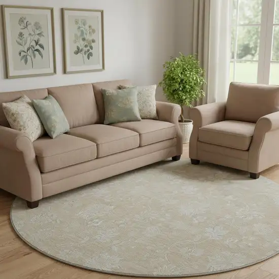 8' Beige And Ivory Floral Washable Round Rug With UV Protection Photo 1