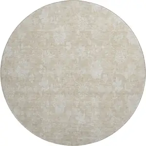 Photo of 8' Beige And Ivory Floral Washable Round Rug With UV Protection