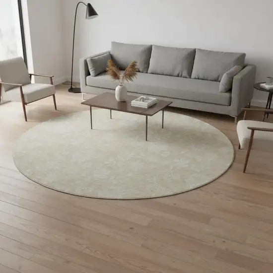 8' Beige And Ivory Floral Washable Round Rug With UV Protection Photo 2