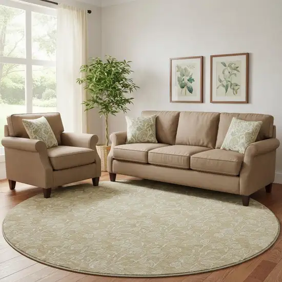 8' Beige And Ivory Floral Washable Round Rug With UV Protection Photo 1