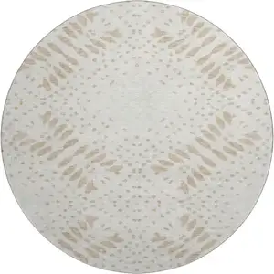 Photo of 8' Beige And Ivory Floral Washable Round Rug With UV Protection