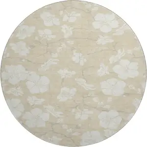 Photo of 8' Beige And Ivory Floral Washable Round Rug With UV Protection
