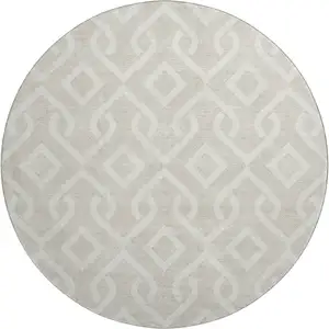 Photo of 8' Beige And Ivory Geometric Washable Round Rug With UV Protection